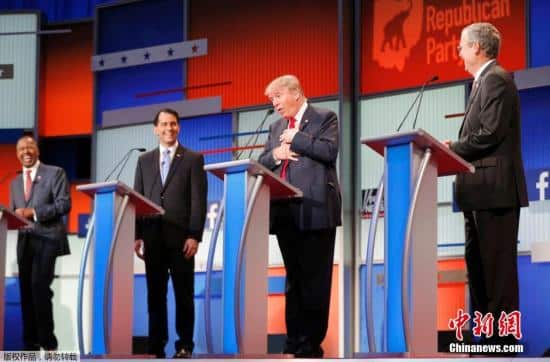  美国共和党总统参选人新年首次辩论“互吐口水”